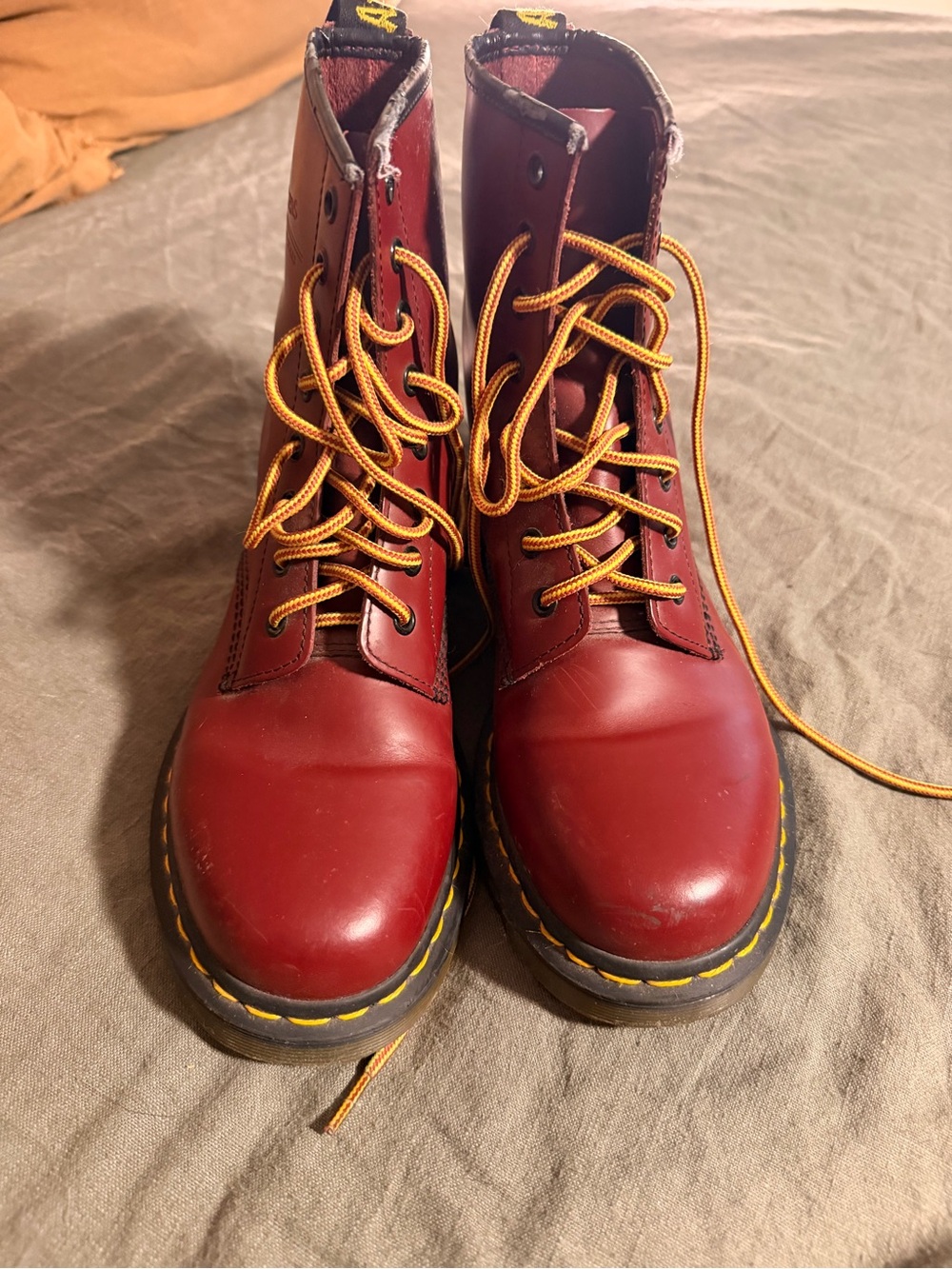 Dr. Martens Cherry Red Leather Lace-Up Boots with Yellow Accents